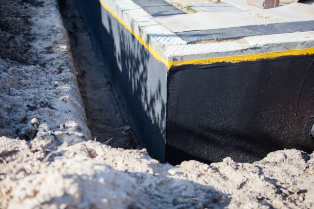 Professional Waterproofing technician working in Middletown, PA